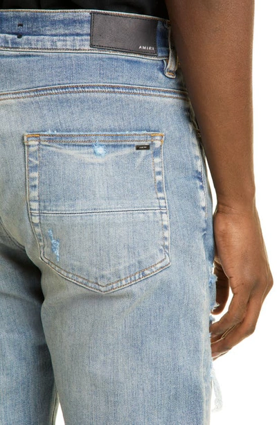 Shop Amiri Bandana Flame Thrasher Ripped Skinny Jeans In Clay Indigo