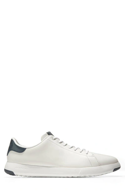 Shop Cole Haan Grandpro Low Top Sneaker In White / Navy Ink