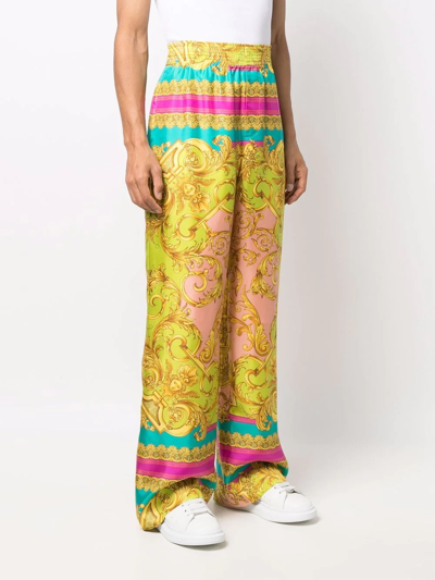 Shop Versace Baroque-print Palazzo Trousers In Yellow