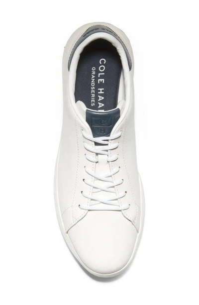 Shop Cole Haan Grandpro Low Top Sneaker In White / Navy Ink