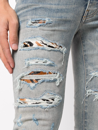 Amiri Mx1 Distressed Skinny Jeans In Blue