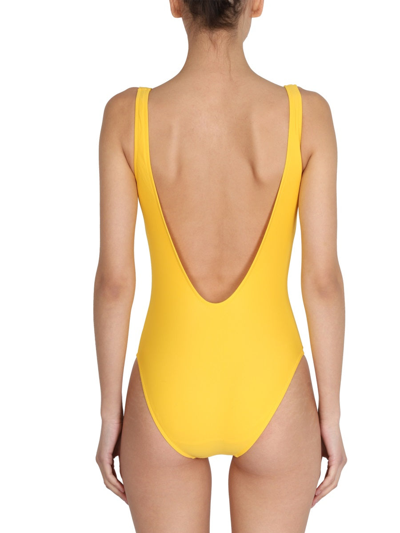 Shop Moschino Maxi Logo One Piece Swimsuit In Yellow