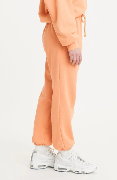 Shop Levi's Organic Cotton Sweatpants In Garment Dye Peach