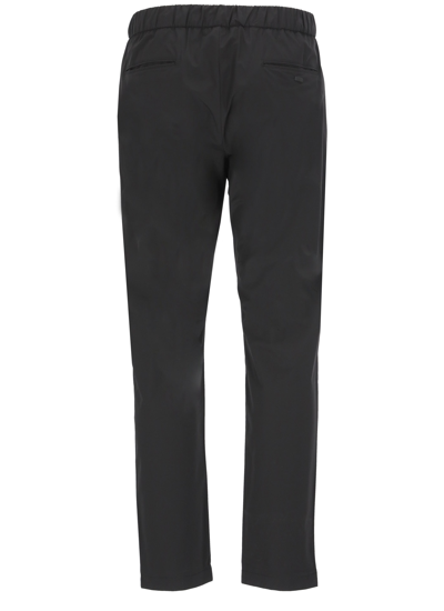 Shop Herno Trousers Black
