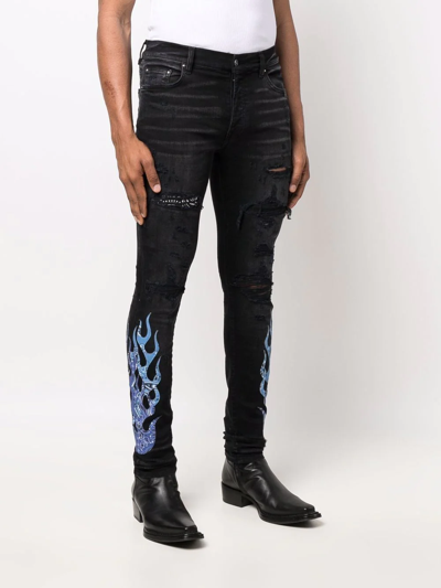 Amiri Bandana-print Fire Skinny Jeans In Schwarz | ModeSens