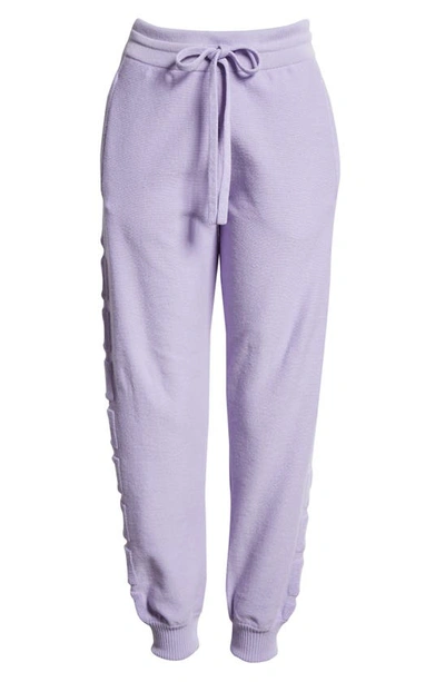 Shop Versace Logo Wool Blend Joggers In Lilac
