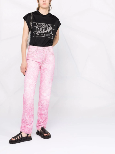 Shop Versace Slogan Logo-print T-shirt In Schwarz