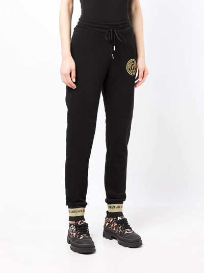 Shop Versace Jeans Couture Embroidered-logo Cotton Track Pants In Schwarz