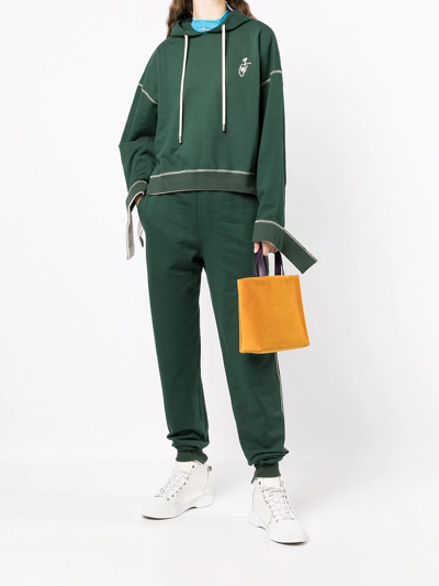 Shop Jw Anderson Tapered-leg Track Pants In Grün