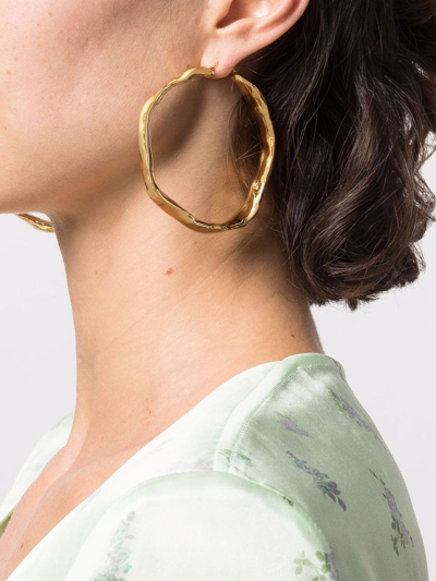 Shop Colville Pretzel Hoop Earrings In Gold