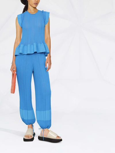 Shop Stella Mccartney Plissé Peplum Blouse In Blau