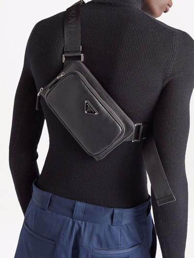 Shop Prada Logo Plaque Zipped Crossbody Bag In Schwarz
