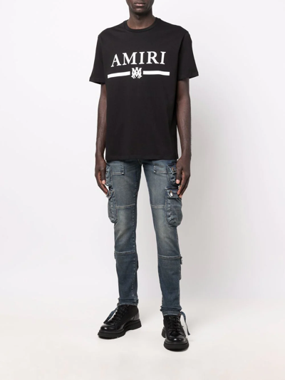 Shop Amiri Logo-print T-shirt In Schwarz