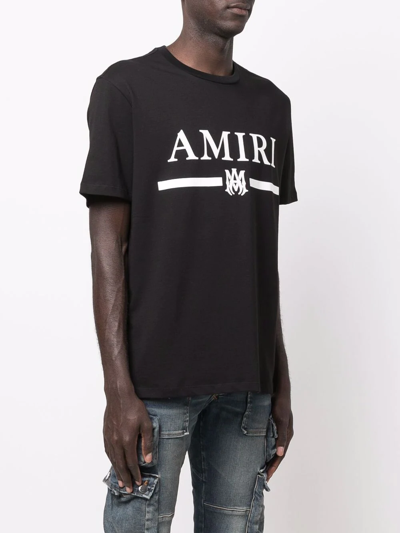 Shop Amiri Logo-print T-shirt In Schwarz