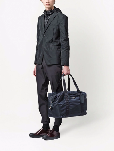 PRADA RE-NYLON TRIANGLE LOGO HOLDALL BAG 