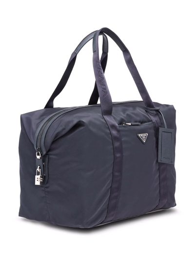 Prada Re-nylon Triangle Logo Holdall Bag In Blau
