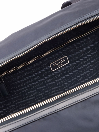 PRADA RE-NYLON TRIANGLE LOGO HOLDALL BAG 