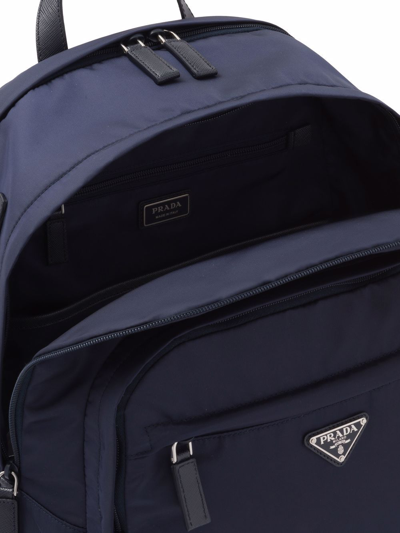 Prada Structured Leather Backpack With Logo Zipper Closure In Blau