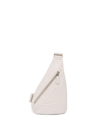 Shop Prada Logo-embossed Cross Backpack In Weiss