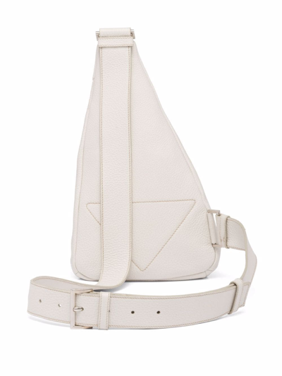 Shop Prada Logo-embossed Cross Backpack In Weiss