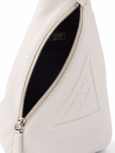 Shop Prada Logo-embossed Cross Backpack In Weiss