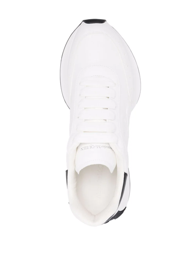 Shop Alexander Mcqueen Embossed Logo Exaggerated-sole Sneakers In Weiss