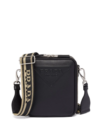 Shop Prada Logo-embossed Saffiano Leather Bag In Schwarz