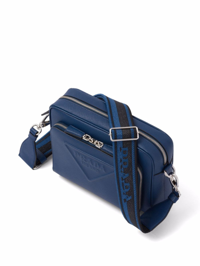 Shop Prada Logo-embossed Saffiano Leather Bag In Blau