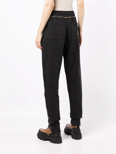 Shop Jw Anderson Tapered-leg Track Pants In Black