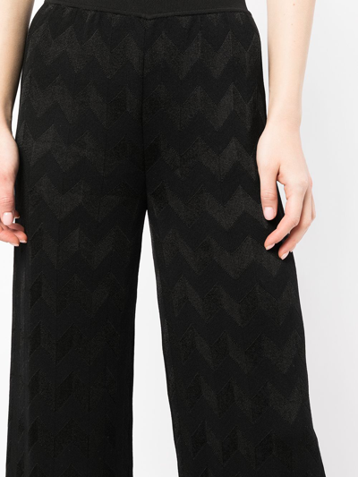 Shop Missoni Chevron-knit Slip-on Flared Trousers In Black
