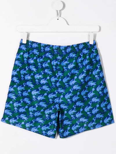 Shop Lacoste All-over Logo-print Swim Shorts In Blue