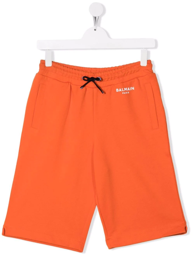 Shop Balmain Teen Logo Print Track Shorts In Orange