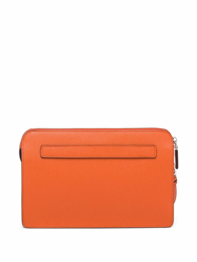 Shop Prada Saffiano Triangle-logo Pouch In Orange