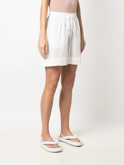 Shop P.a.r.o.s.h Sunny Drawstring Slip-pocket Shorts In White