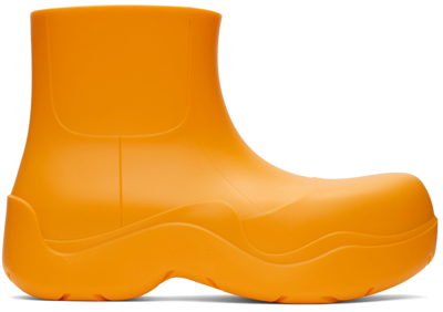 Shop Bottega Veneta Orange Puddle Boots In 7593 Tangerine