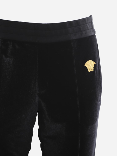 Shop Versace Black Track Pants With Medusa Plaque From