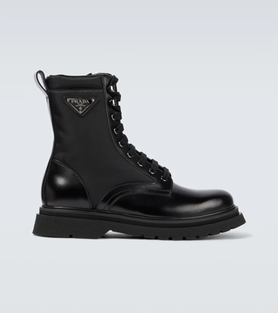 Prada Logo-plaque Panelled Ankle Boots In Black