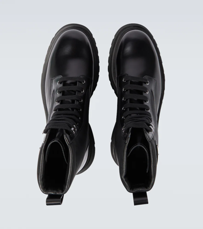 Prada Logo-plaque Panelled Ankle Boots In Black