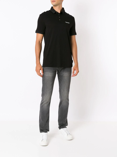 Shop Armani Exchange Logo-print Polo Shirt In Black