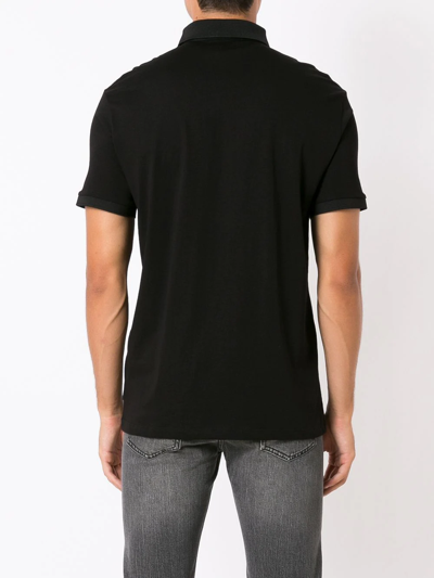 Shop Armani Exchange Logo-print Polo Shirt In Black