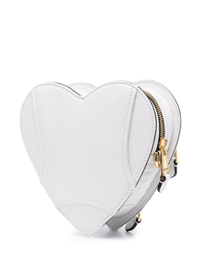 Shop Moschino Heart Biker Leather Crossbody Bag In White