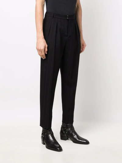 Shop Saint Laurent Striped Tapered Trousers In Schwarz