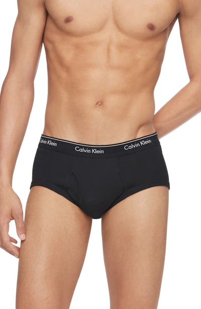 Shop Calvin Klein 4-pack Briefs In Blk/blk/blk/blk