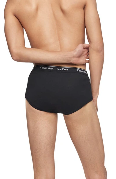 Shop Calvin Klein 4-pack Briefs In Blk/blk/blk/blk