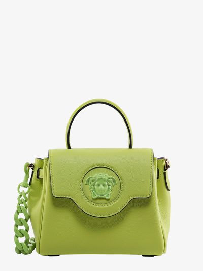 Shop Versace Handbag In Green