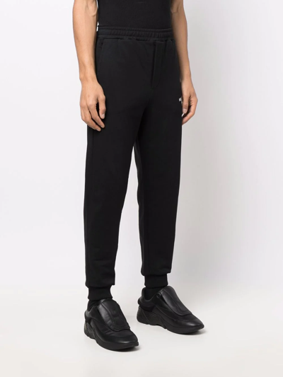 Shop Helmut Lang Logo-print Tapered Track Pants In Schwarz