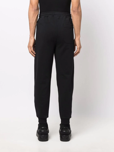 Helmut Lang Logo-print Tapered Track Pants In Schwarz