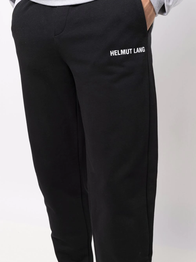 Shop Helmut Lang Logo-print Tapered Track Pants In Schwarz