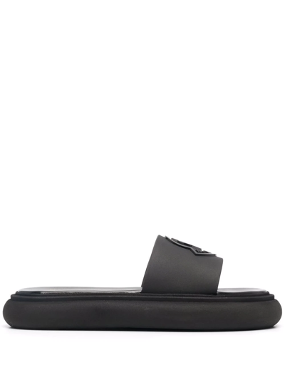 Shop Moncler Jeanne Logo-embossed Slides In Schwarz