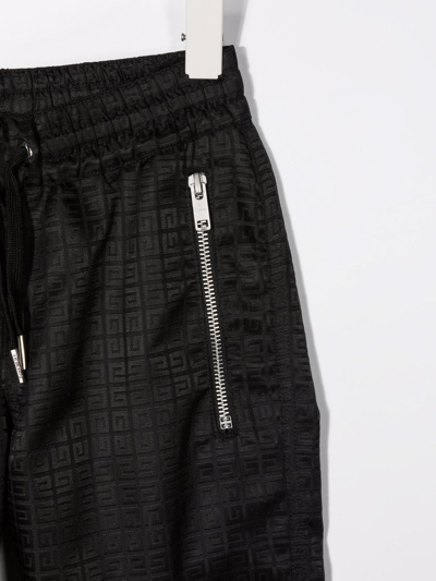 Givenchy Monogram-print Track Pants In Black